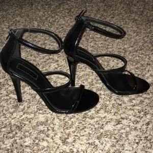 Never worn black strapped heel
